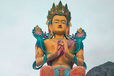 A serene Buddha statue at Diskit Monastery, symbolizing peace and spirituality in the Ladakh region