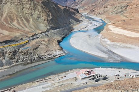 The confluence of the Indus and Zanskar Rivers, known as Sangam, near Nimmu Village, where two distinct river colors merge